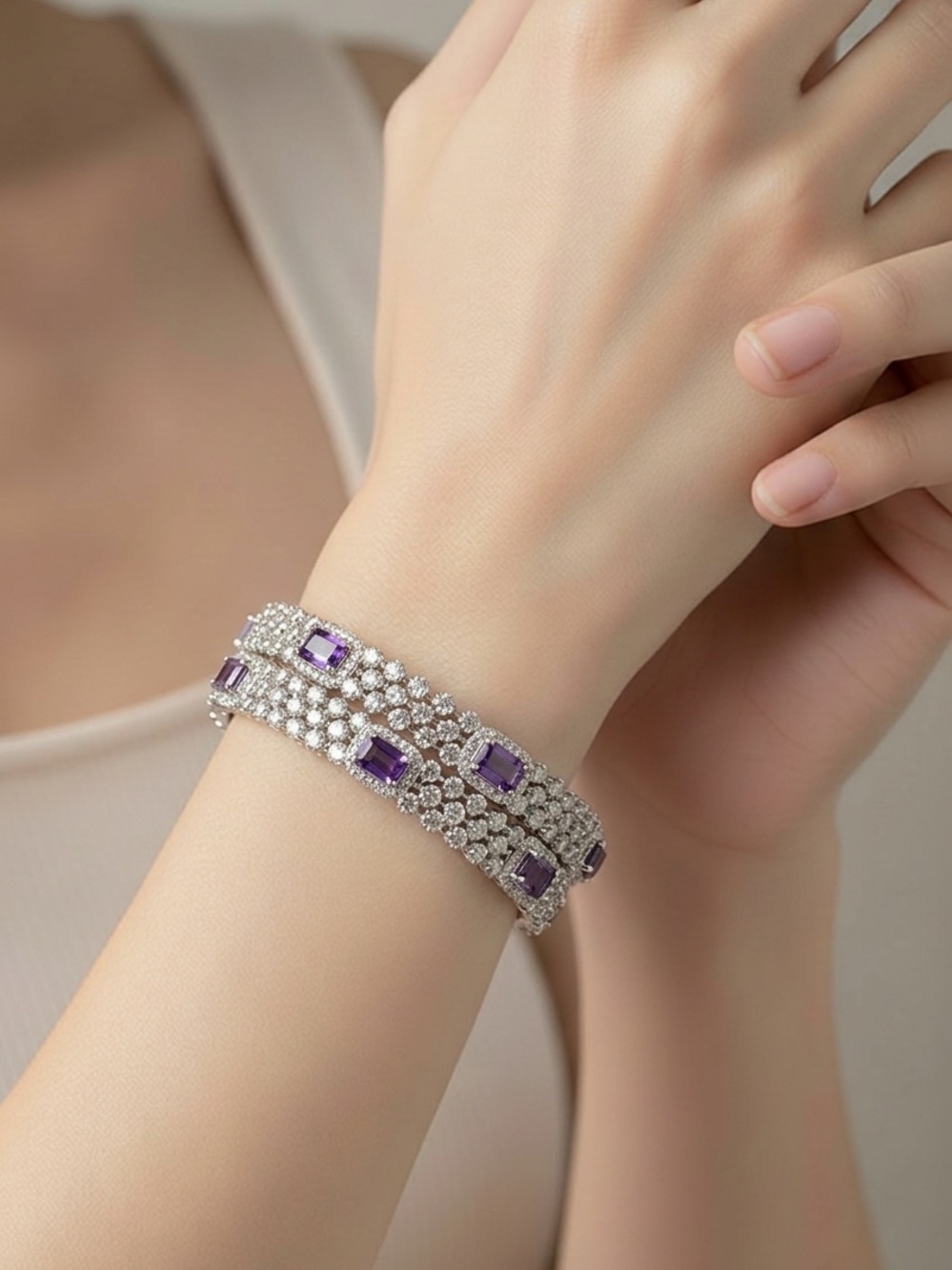 Elegant Silver tone Bracelet with Purple Gem Accents